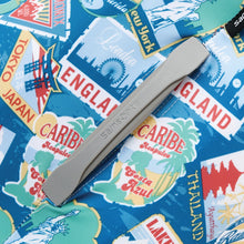 Load image into Gallery viewer, Close up to the suitcase with the cover on. It features an opening on the side panel to access the grab handle.