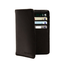 Load image into Gallery viewer, Front view of the passport cover slightly opened, showing four credit cards in the interior.