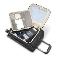 Load image into Gallery viewer, Interior view of the suitcase and organization pack filled with clothes accessories.