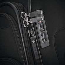 Load image into Gallery viewer, Close up to the side panel's TSA approved three-digit combination lock.