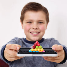 Load image into Gallery viewer, A child holding the game board with the pieces arranged.