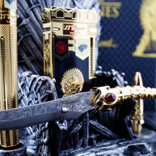 Load image into Gallery viewer, Arrangement of the Game of Thrones Collectors contents. The close up is on the knife-shaped letter opener set on the throne.