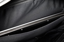 Load image into Gallery viewer, A laptop shown tucked into the laptop compartment.