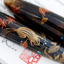 Load image into Gallery viewer, Close up to the pen's barrel and cap focusing on a chipmunk.