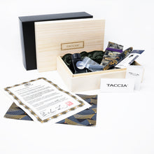Load image into Gallery viewer, The fountain pen arranged with its presentation box, outer box, paperwork, inks, converter, and kimono sleeve on a white background.