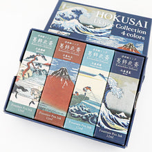 Load image into Gallery viewer, Four ink bottles arranged inside the Hokusai box