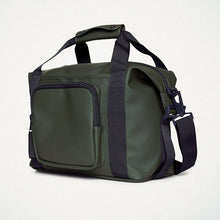 Load image into Gallery viewer, Angled front panel view of the green bag