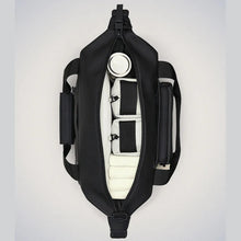 Load image into Gallery viewer, Top panel view of the kit bag with with contents organized in the main compartment.