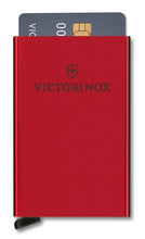 Load image into Gallery viewer, Victorinox Altius Secrid Essential Card Wallet - Red
Image of Front Panel View, showing one credit card in Ejected Position.
Dimensions: 4"H x 2.5"W x 0.3"D
Weight:          0.1 lbs.
