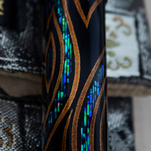 Load image into Gallery viewer, Close up to the barrel, focused on the abalone shell designs on the peacock feathers.