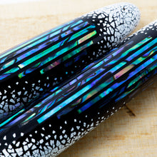 Load image into Gallery viewer, Close up to the abalone and quail egg shell on the pen's cap and barrel.