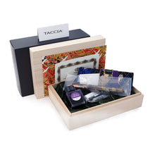 Load image into Gallery viewer, The Dawn's Celebration in its presentation box with the ink bottle, ink cartridge, documents, and boxes on a white background.