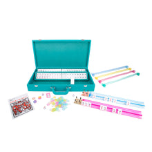 Load image into Gallery viewer, Teal case with mahjong chips and accessories arranged on a white background.