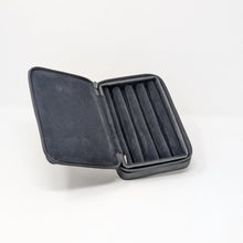 Load image into Gallery viewer, On a white background: The opened pen case in black on its own.