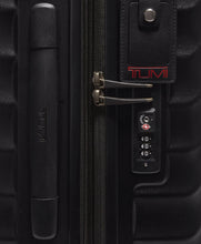 Load image into Gallery viewer, Close up to the side panel's grab handle, tag, and three-digit combination lock.