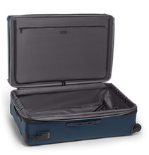 Load image into Gallery viewer, Angled interior view of the blue suitcase.