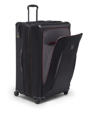 Load image into Gallery viewer, Angled front panel view of the black suitcase with the front panel pocket unzipped.