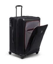 Load image into Gallery viewer, Angled front panel view of the black suitcase with the front pocket unzipped.