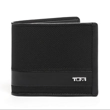 Load image into Gallery viewer, Front panel view of the wallet with Tumi logo