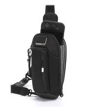 Load image into Gallery viewer, Angled front panel view of the bag showing a Nintendo Switch peeking from the inside compartment.