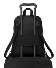 Load image into Gallery viewer, Back panel view with the attachment strap holding the bag to a suitcase's telescopic handle.