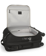 Load image into Gallery viewer, The suitcase laid on its back with the front panel's pocket unzipped and lifted. The interior lining is light gray and has a zipper compartment.