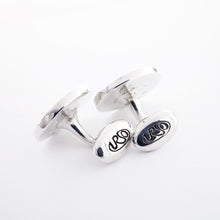 Load image into Gallery viewer, The two cufflinks showing the engraved URSO logos on the back portion.