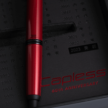 Load image into Gallery viewer, Close up to the fountain pen's barrel in the presentation box. Above the pen's middle rings, the text PILOT JAPAN is printed in black.