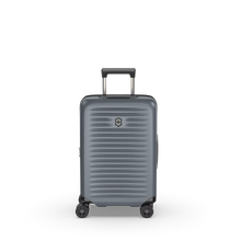 Load image into Gallery viewer, Front panel view of the suitcase with the telescopic handle partly extended.