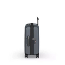 Load image into Gallery viewer, Side panel view of the hard shell suitcase. It features a grab handle and a TSA approved, three-digit combination lock.