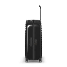 Load image into Gallery viewer, Side panel view of the black hard side suitcase, showing a grab-handle and a three-digit combination TSA approved lock