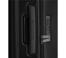 Load image into Gallery viewer, Close up to the black suitcase's side panel, showing the grab handle and a TSA approved three-digit combination lock.