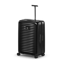 Load image into Gallery viewer, Angled front panel view of the black hard-side suitcase.