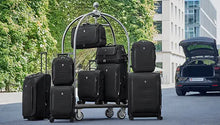 Load image into Gallery viewer, The collection of different suitcases and duffle bags arranged in a carrier. Placed on an urban setting.