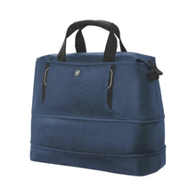 Load image into Gallery viewer, Angled front view of the blue duffle bag with the expandable feature extended.