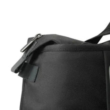 Load image into Gallery viewer, Close up to the black duffle bag's zipper.
