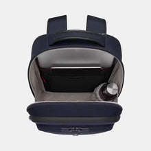 Load image into Gallery viewer, Interior view of the navy blue backpack with a laptop and tablet in the back panel pocket. A water bottle is tucked inside a compartment.