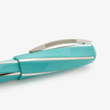 Load image into Gallery viewer, Close up to the Cap's clip of the Visconti Divina Elegance Wave Pen. It has an engraving with the word VISCONTI on both sides.