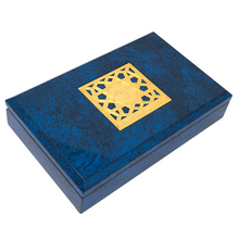 Load image into Gallery viewer, Top view of the presentation box. it has marbled black and blue appearance with a golden square with designs at the center of the lid featuring the Visconti logo.
