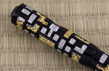 Load image into Gallery viewer, Close up to the side of the cap showing the gold vermeil pieces, silver pieces, and diamonds.