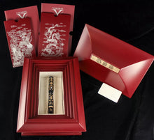 Load image into Gallery viewer, The Fountain Pen with the following contents: The red wooden presentation box and lid, and the documents.
