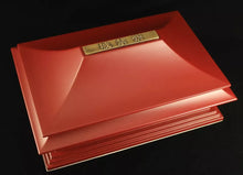 Load image into Gallery viewer, Angled view of the red presentation box. It's design is similar to a simple pagoda box.