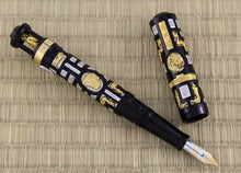 Load image into Gallery viewer, The Fountain pen with the cap set off to the side. The cap has a gold vermeil piece that reads FORBIDDEN CITY.