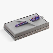 Load image into Gallery viewer, The pen shown in its gray presentation box. The inside is made of a soft type of felt to protect the pen, and the outside of the box is decorated with a pattern of the Visconti "V" Logo.