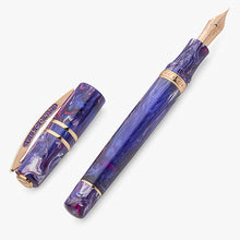 Load image into Gallery viewer, Front view of the Fountain Pen with the cap set to its side. Both items are placed on a white background.