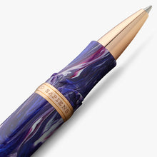 Load image into Gallery viewer, Close up to the grip section of the rollerball pen. It features a rose-gold ring with the engraving: "HOMO SAPIENS". The nose section of the pen is in matching rose-gold.