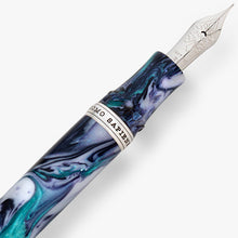 Load image into Gallery viewer, Close up to the grip section of the Visconti Homo Sapiens Earth Origins Air Fountain Pen. The nib has an engraving with decorations and the word VISCONTI followed by 18kt, 750, and EF for Extra Fine point.
