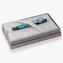 Load image into Gallery viewer, The Visconti Homo Sapiens Earth Origins Air on its presentation box, placed under the felt strap.