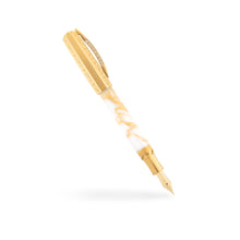 Load image into Gallery viewer, The Visconti Il Magnifico Calcatta Gold Fountain Pen with the cap posted. Set on a white background.