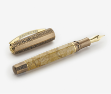 Load image into Gallery viewer, Angled view of the Visconti Il Magnifico Egyptian Marble Fountain Pen with the cap set to the side. Laid on a white background.
